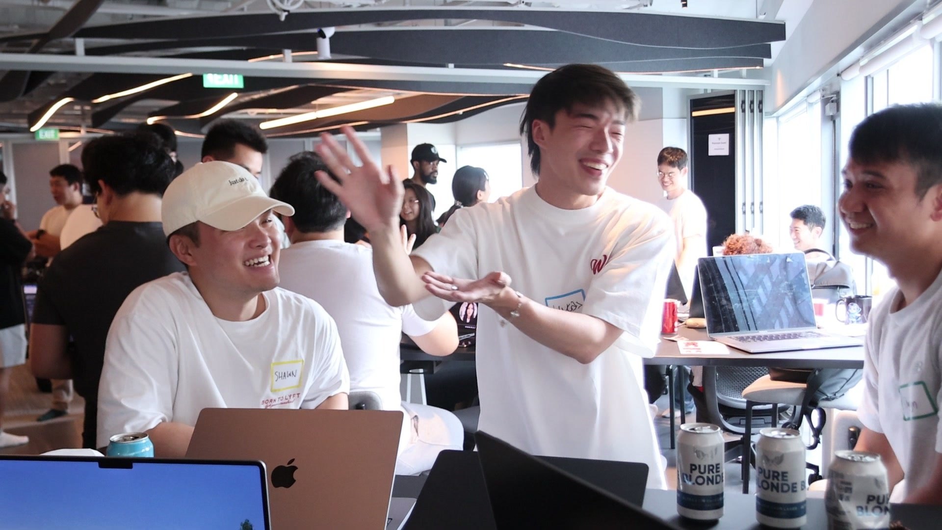 Metacamp community members celebrating during a demo session
